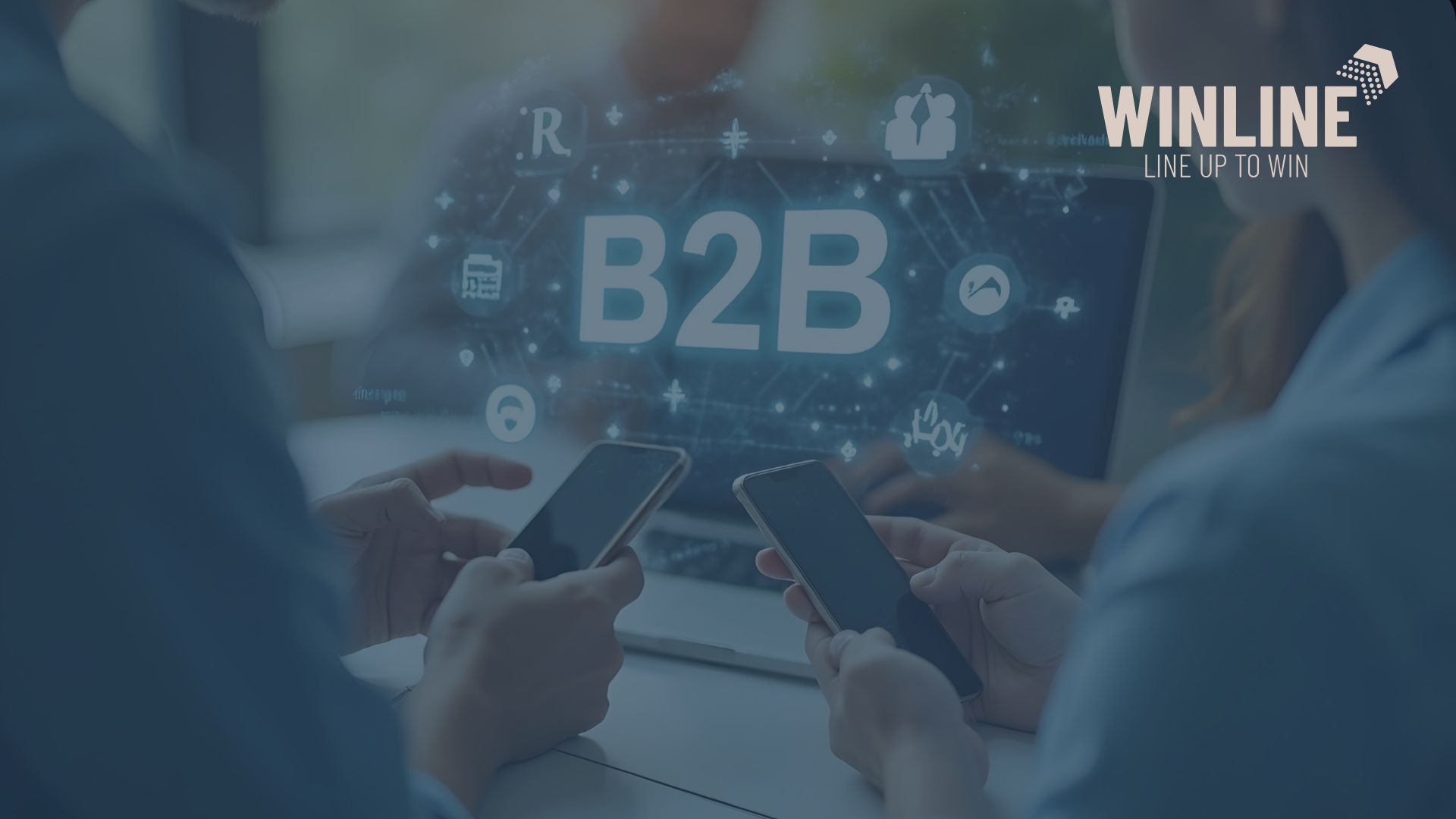 Umawianie spotkań B2B – specjaliści sprzedaży pracujący na smartfonach i laptopie